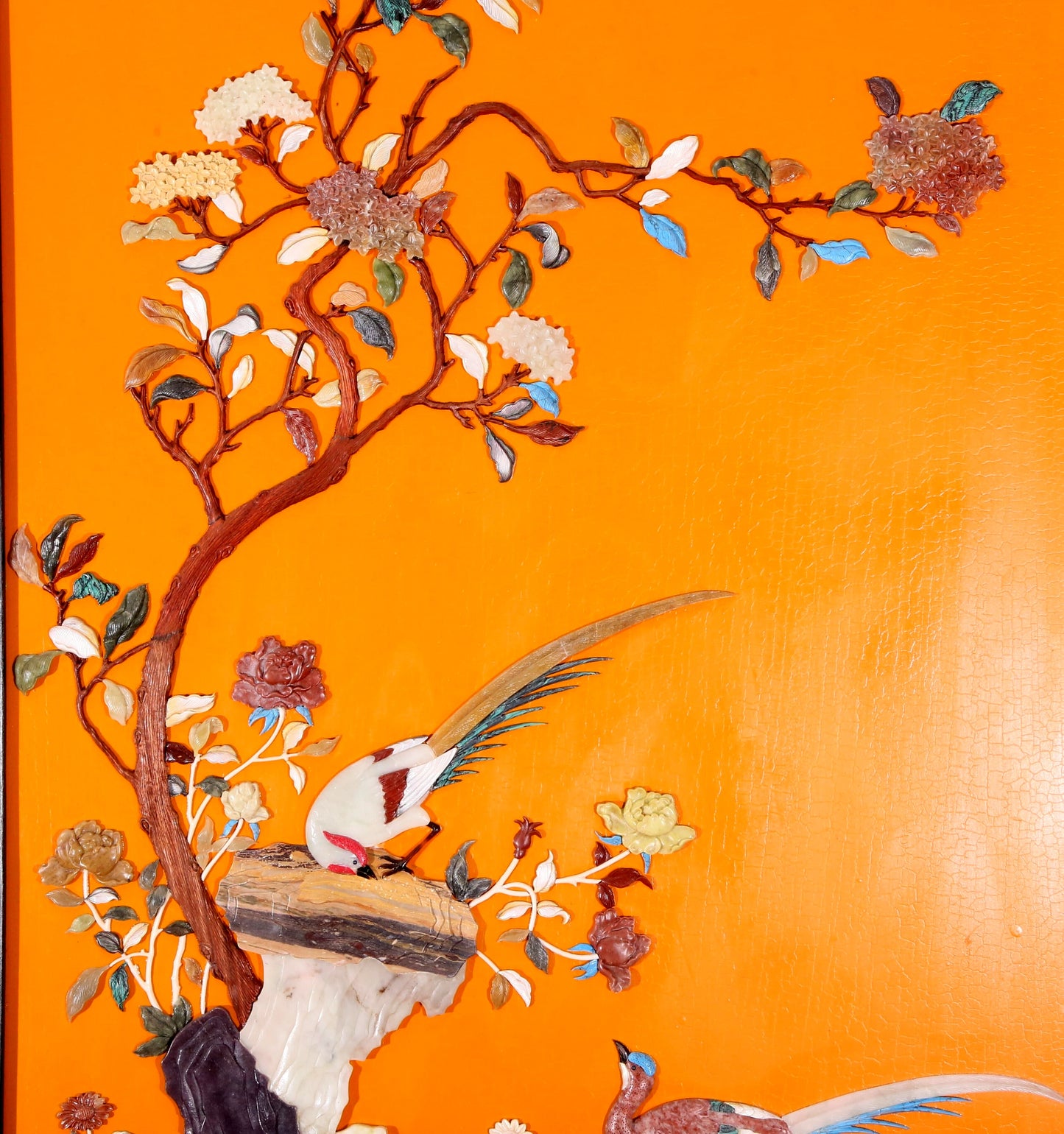 An exquisite zitanwood lacquered hanging screen with flower and bird patterns inlaid with gemstones