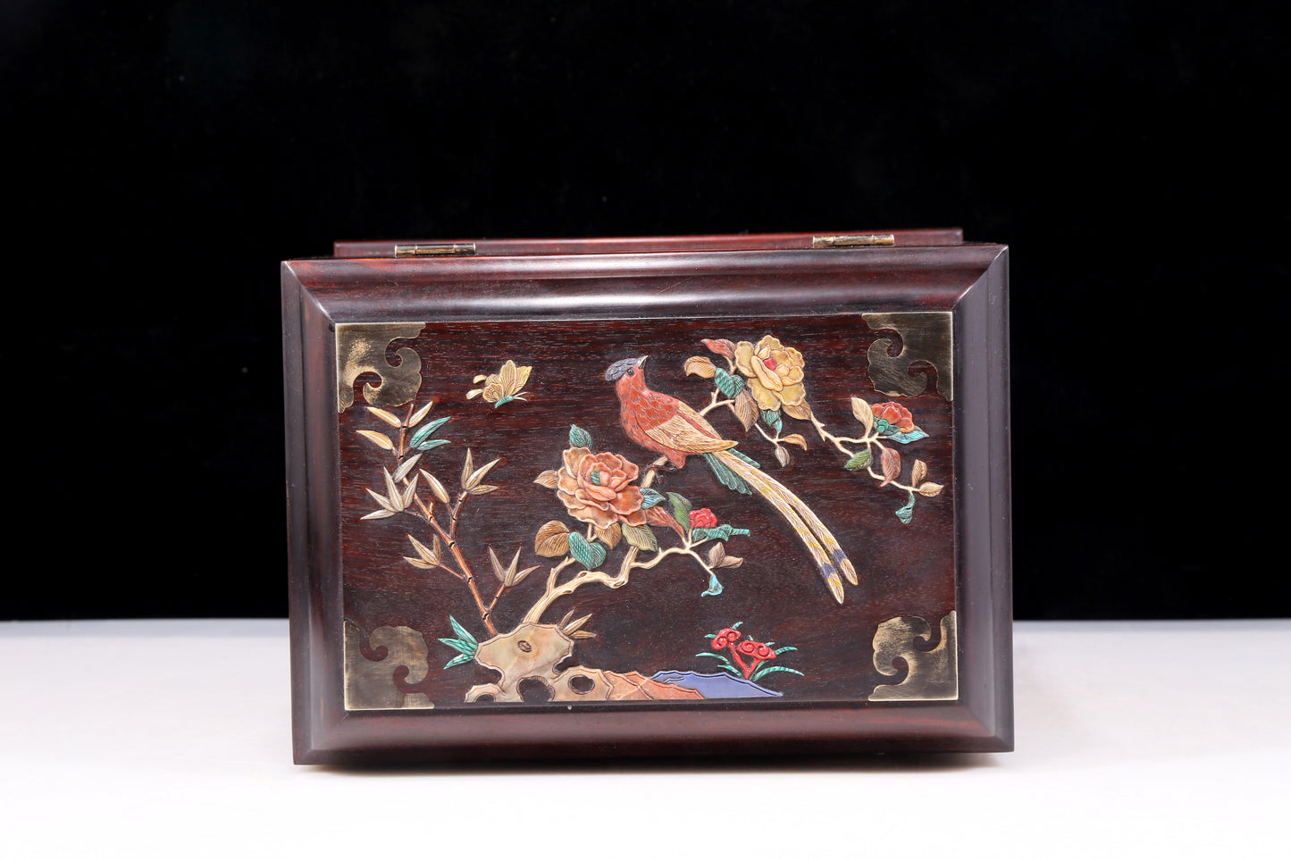 A perfect pair of huanghuali wood cabinets with inlaid gems and flower and bird patterns