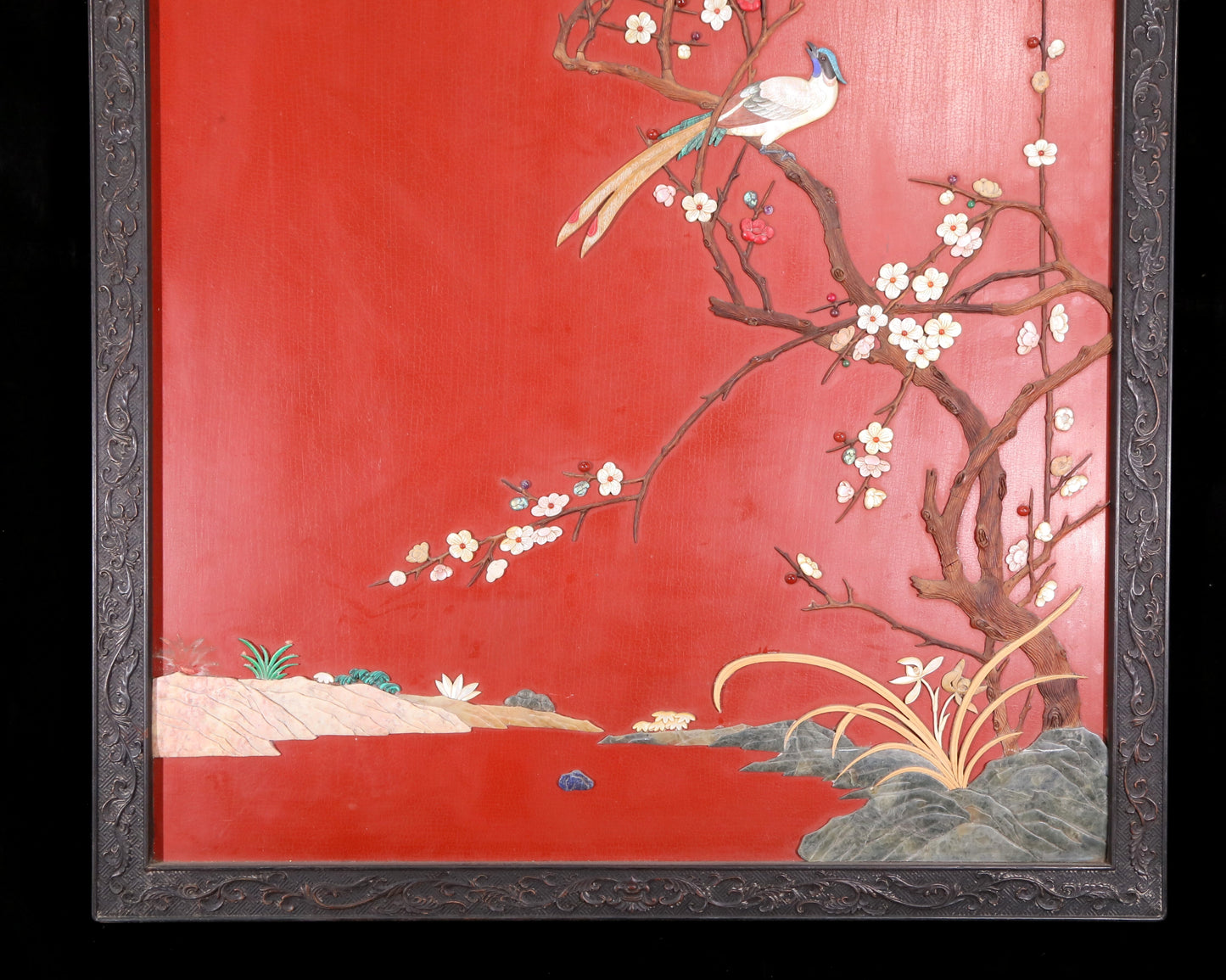 An exquisite zitanwood lacquered hanging screen with flower and bird patterns inlaid with gemstones