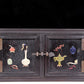 A perfect pair of zitanwood inlaid gem treasure map cabinets