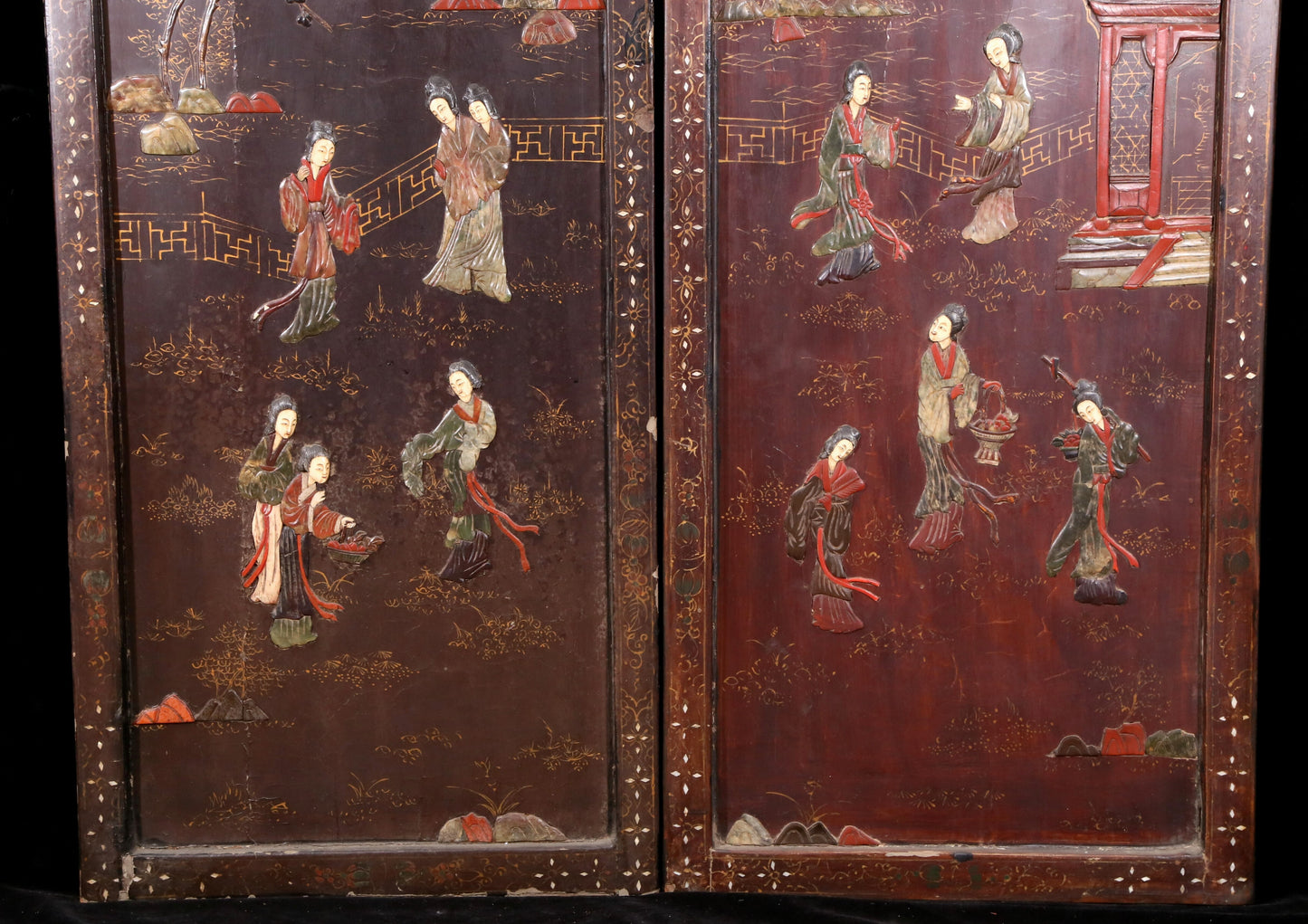 A set of four hanging screens filled with lacquer and painted landscapes and figures inlaid with gemstones