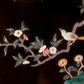 An exquisite lacquered huanghuali wood hanging screen with flower and bird patterns inlaid with gemstones