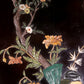 An exquisite lacquered huanghuali wood hanging screen with flower and bird patterns inlaid with gemstones