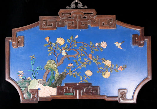 An exquisite lacquered huanghuali wood hanging screen with flower and bird patterns inlaid with gemstones