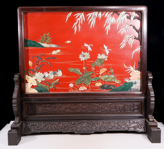 An exquisite zitanwood lacquered, gold-embedded, flower-and-bird pattern table screen