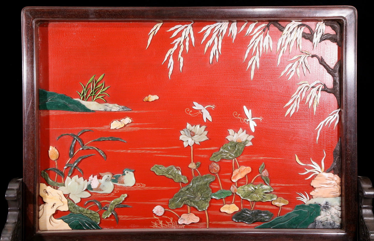 An exquisite zitanwood lacquered, gold-embedded, flower-and-bird pattern table screen