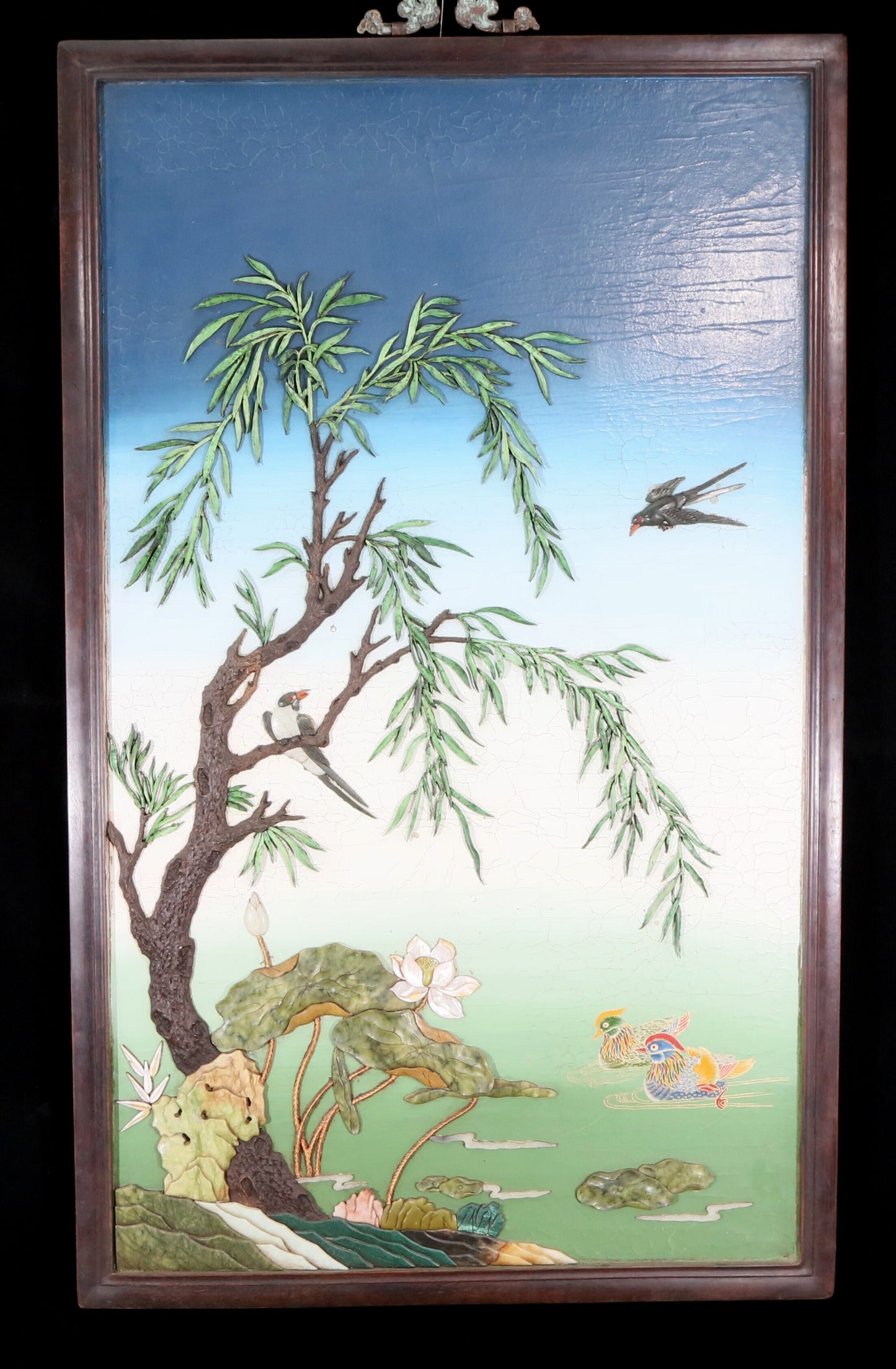 An exquisite zitanwood painted and painted hanging screen with inlaid gems and landscapes, flowers and birds.