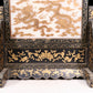 An exquisite zitanwood lacquered table screen with gold floral and dragon patterns