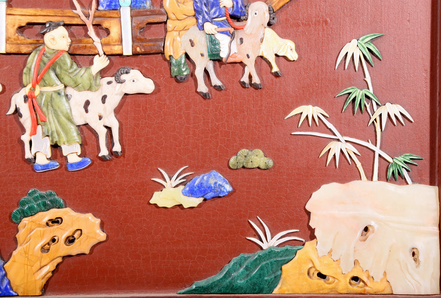 An exquisite huanghuali wood lacquered, gold-embedded, landscape and figure table screen