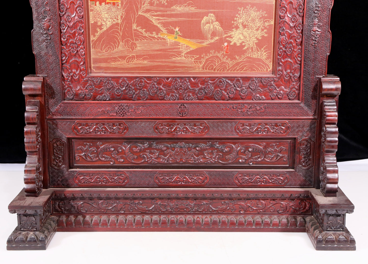 An exquisite huanghuali wood lacquered, gold-embedded, landscape and figure table screen