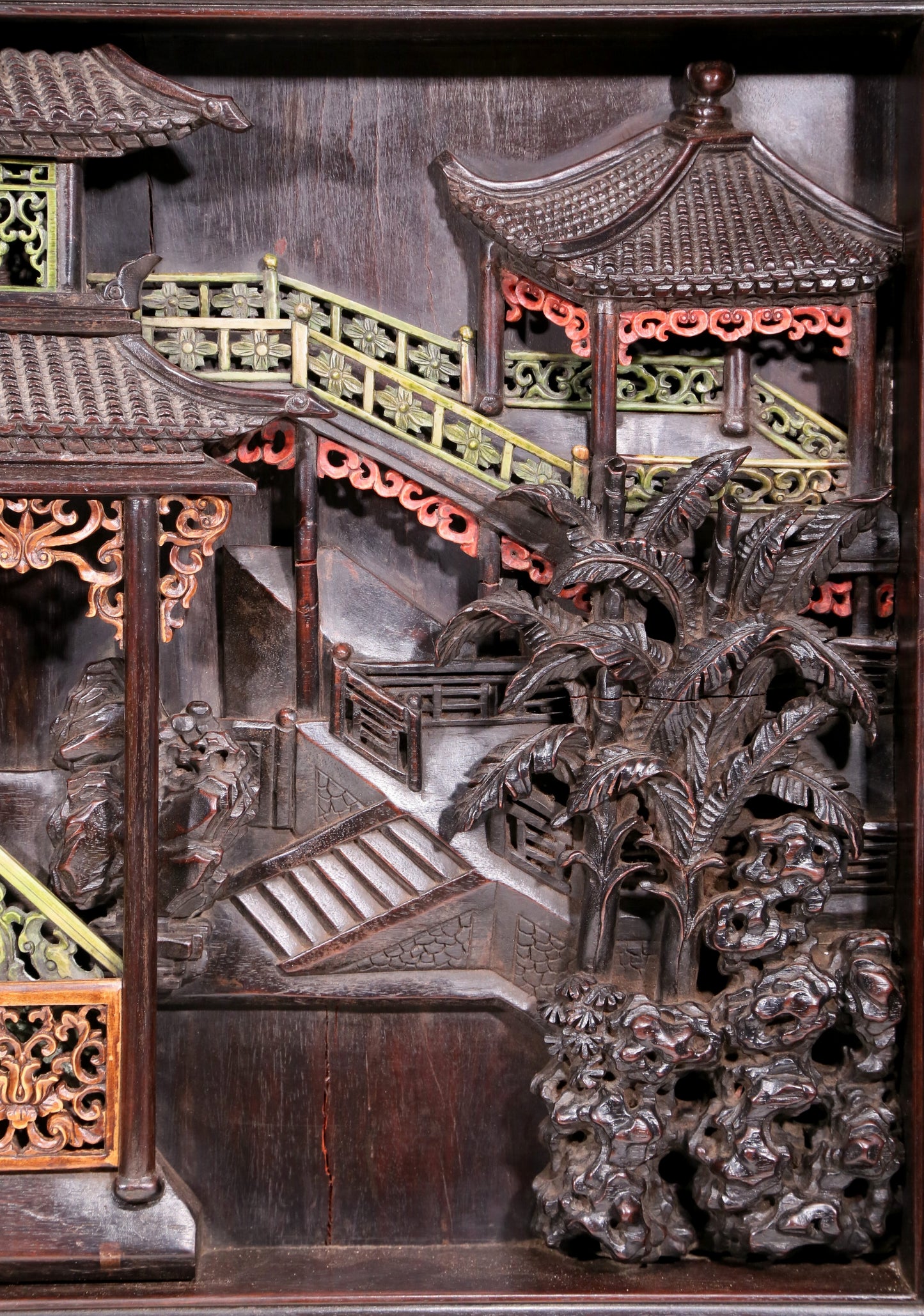 An exquisite zitanwood table screen filled with lacquer, painted with gold and inlaid with white jade with landscape and figure patterns.