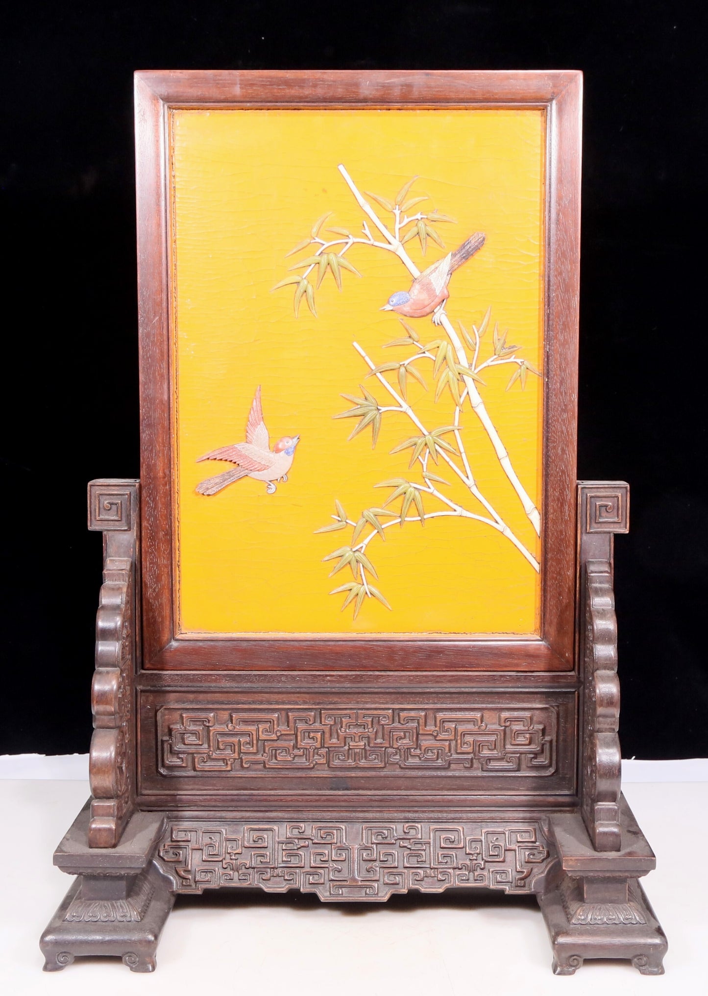 An exquisite zitanwood lacquered, gold-embedded, flower-and-bird pattern table screen