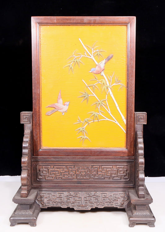 An exquisite zitanwood lacquered, gold-embedded, flower-and-bird pattern table screen