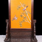 An exquisite zitanwood lacquered, gold-embedded, flower-and-bird pattern table screen