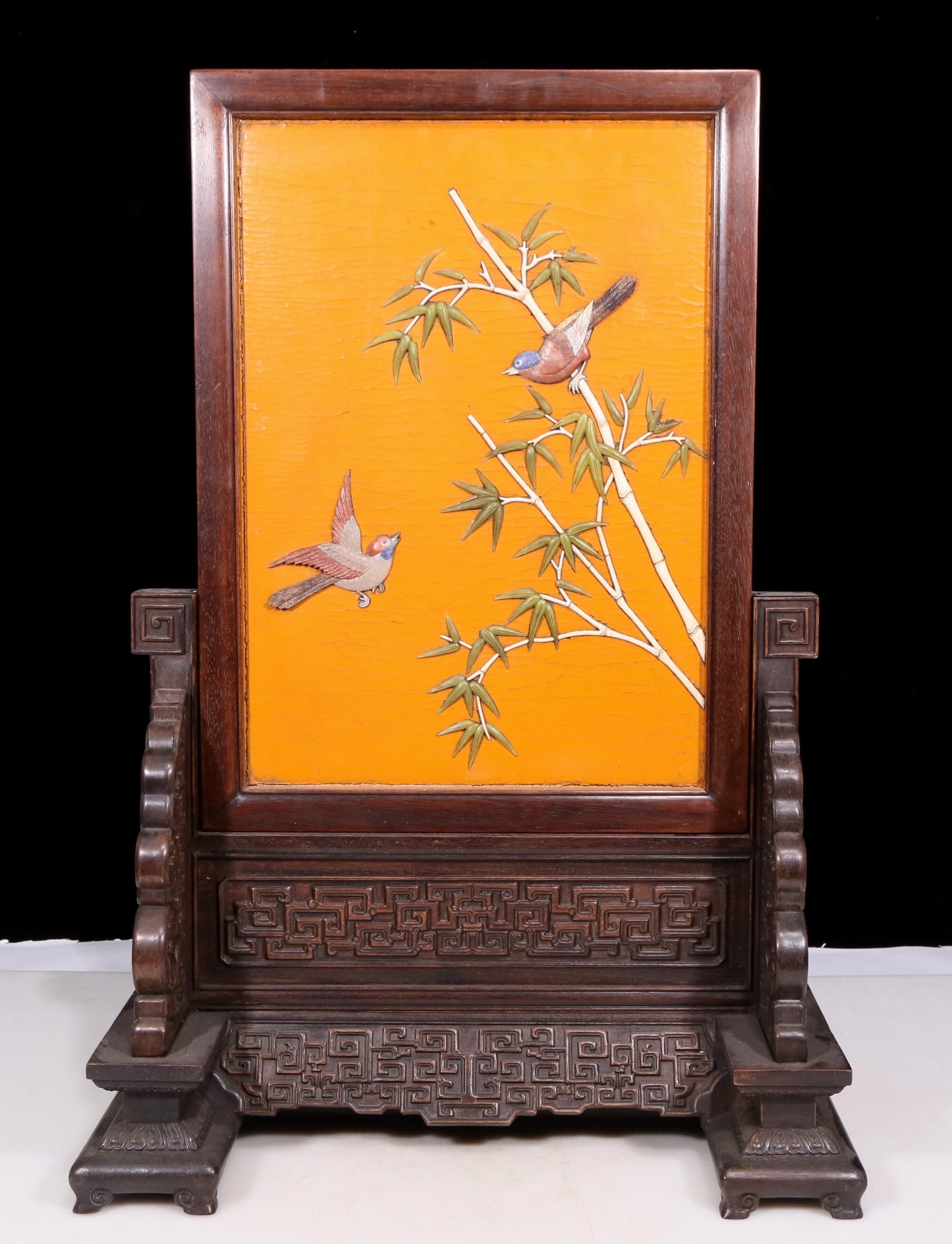 An exquisite zitanwood lacquered, gold-embedded, flower-and-bird pattern table screen