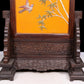 An exquisite zitanwood lacquered, gold-embedded, flower-and-bird pattern table screen