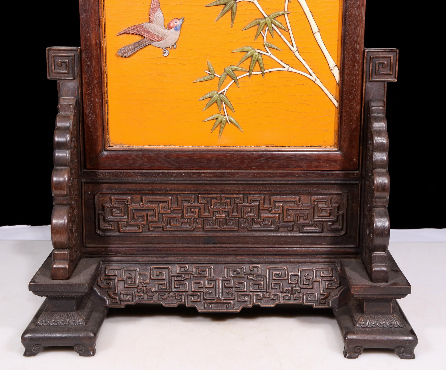 An exquisite zitanwood lacquered, gold-embedded, flower-and-bird pattern table screen