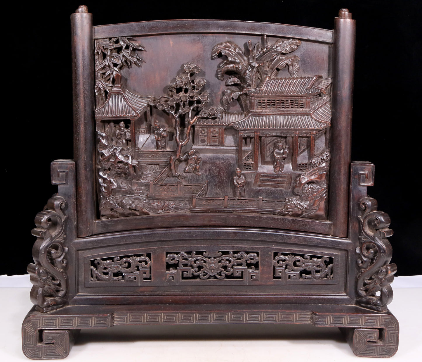 An exquisite zitanwood table screen with landscape and figure patterns