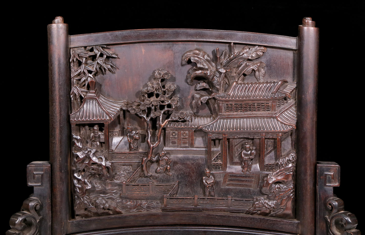 An exquisite zitanwood table screen with landscape and figure patterns