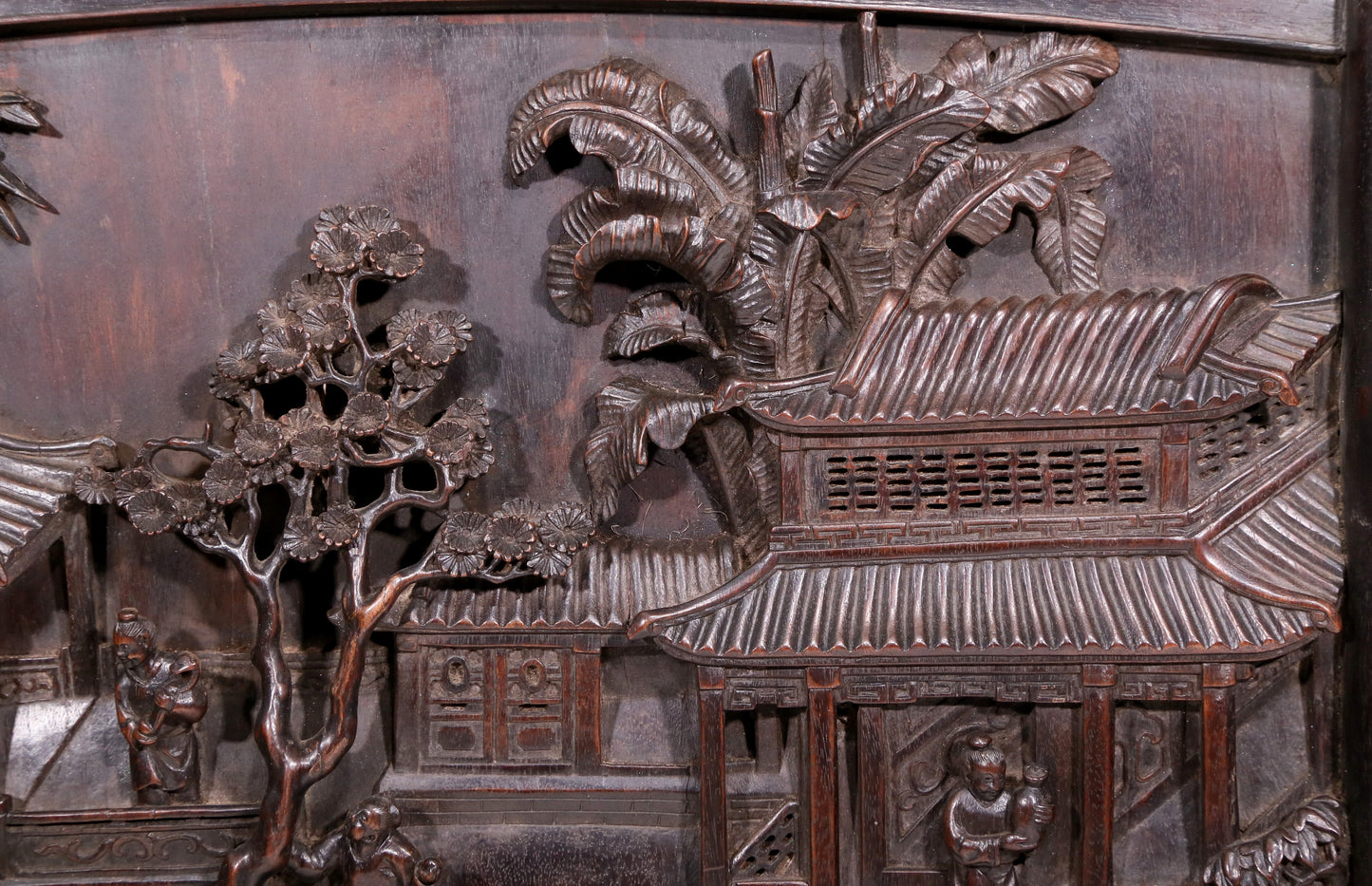 An exquisite zitanwood table screen with landscape and figure patterns