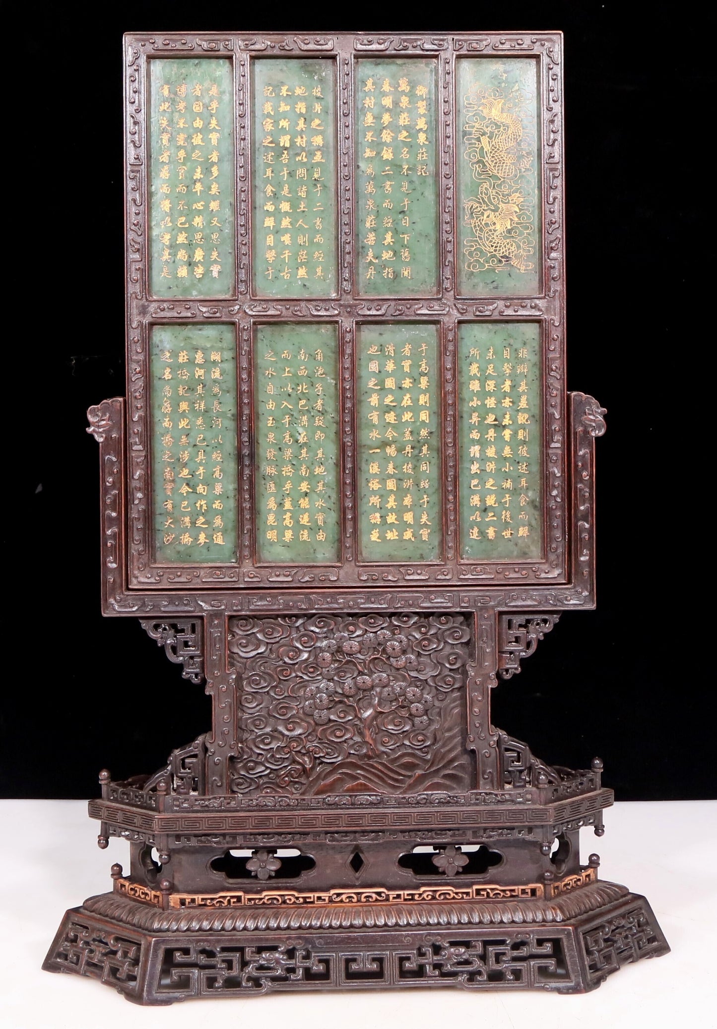 An exquisite zitanwood table screen inlaid with jasper dragon patterns