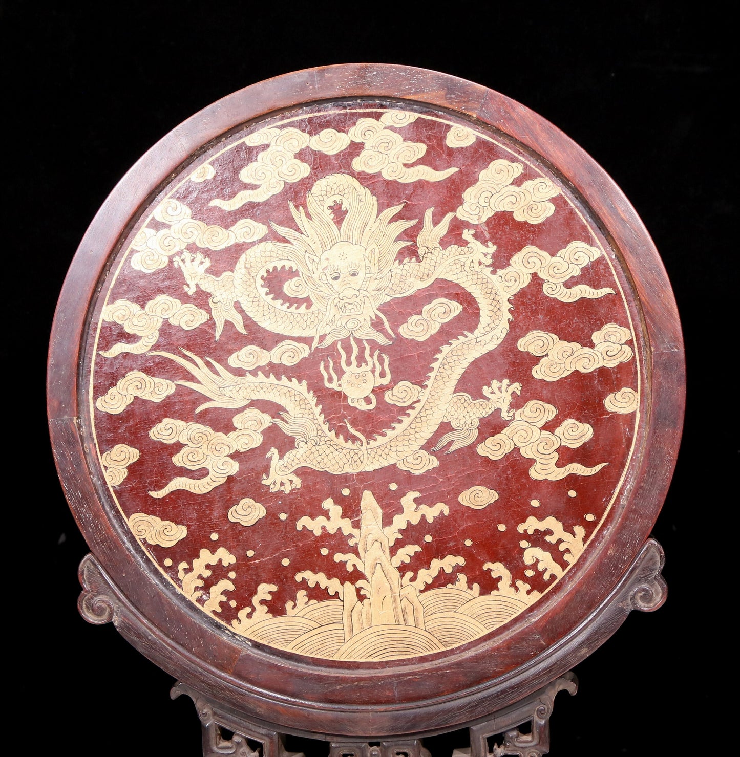 An exquisite zitanwood lacquered, gold-embedded landscape pattern table screen