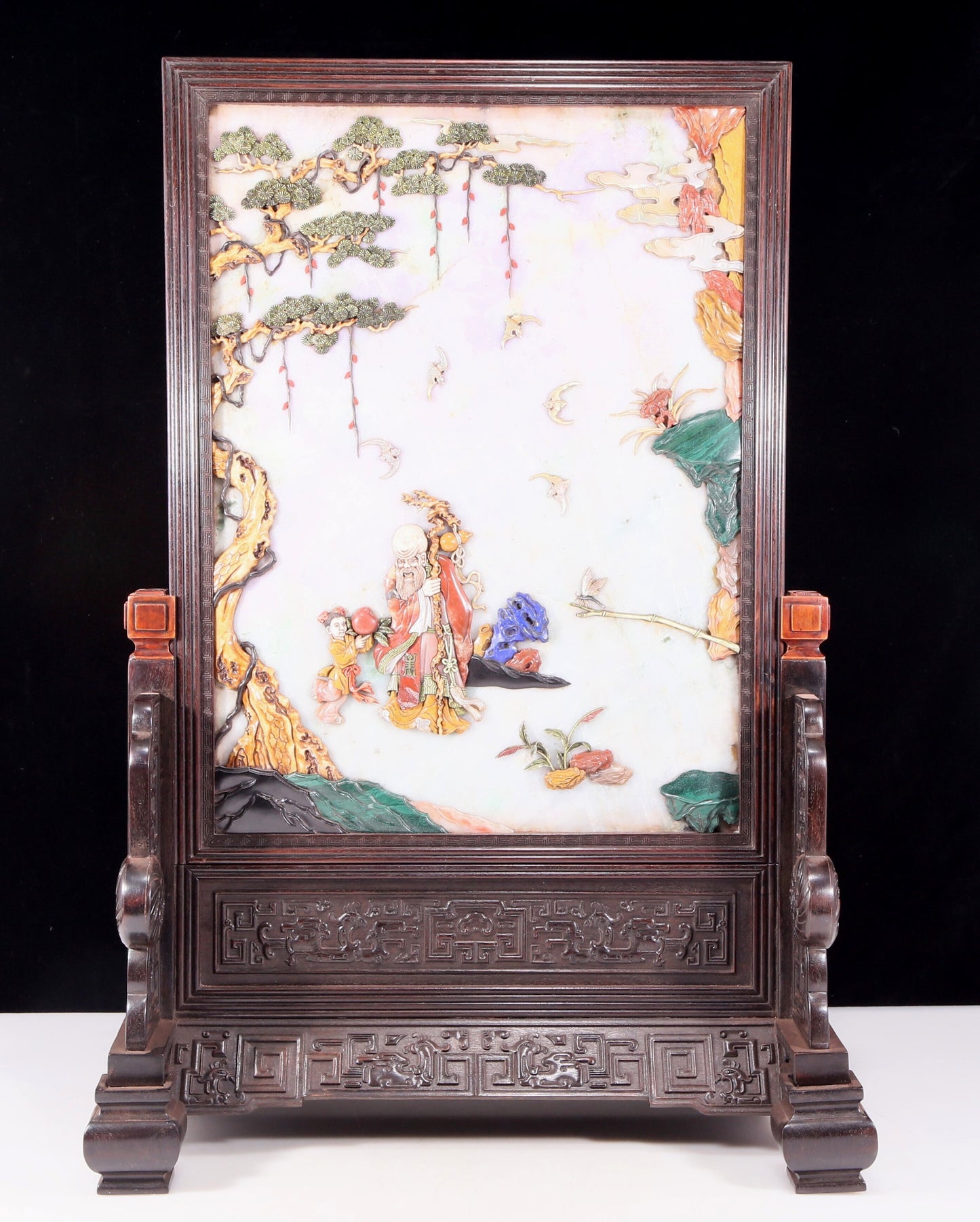 An exquisite zitanwood lacquered, gold-embedded, character-patterned table screen