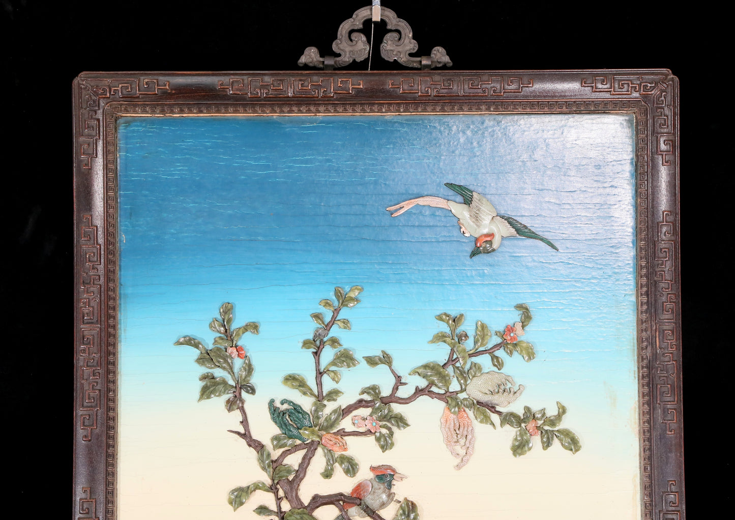 An exquisite zitanwood painted and painted hanging screen with inlaid gems and landscapes, flowers and birds.