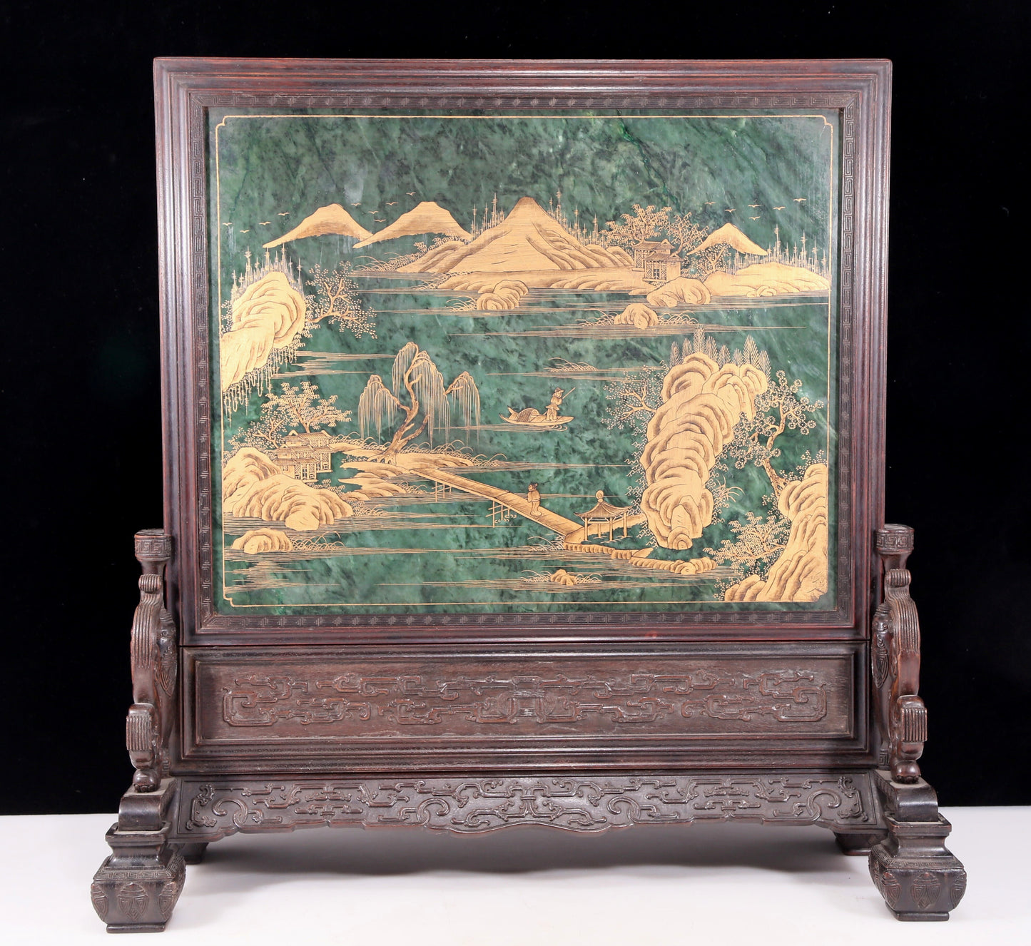 An exquisite zitanwood inlaid with jasper, gold and gemstone elephant pattern table screen