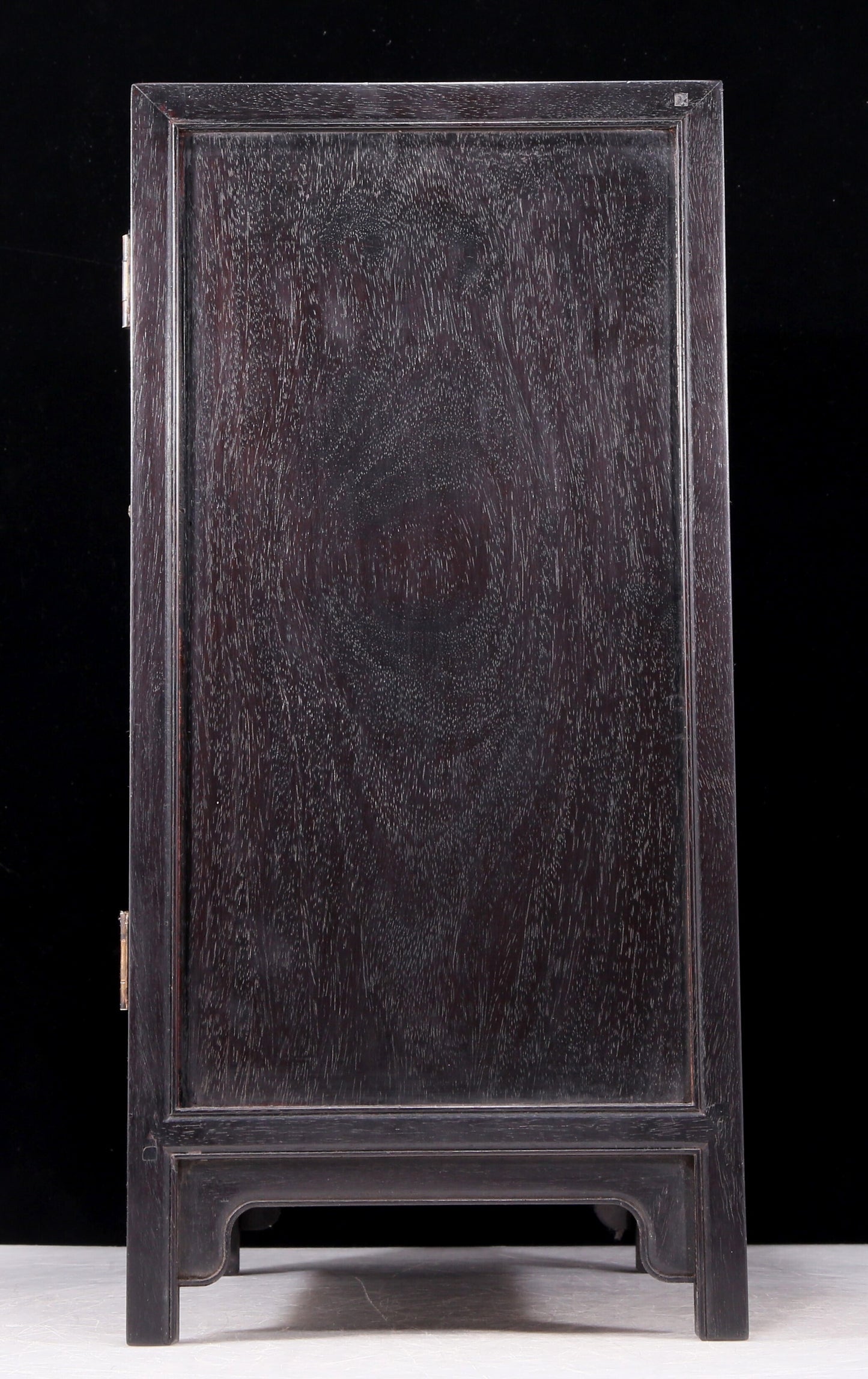 An exquisite zitanwood cabinet inlaid with gems and patterns of fortune, wealth, longevity and happiness