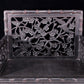 An exquisite zitanwood cabinet with inlaid gemstones and flower and bird patterns