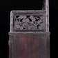 An exquisite zitanwood cabinet with inlaid gemstones and flower and bird patterns