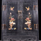 An exquisite zitanwood cabinet with inlaid gemstones and flower and bird patterns