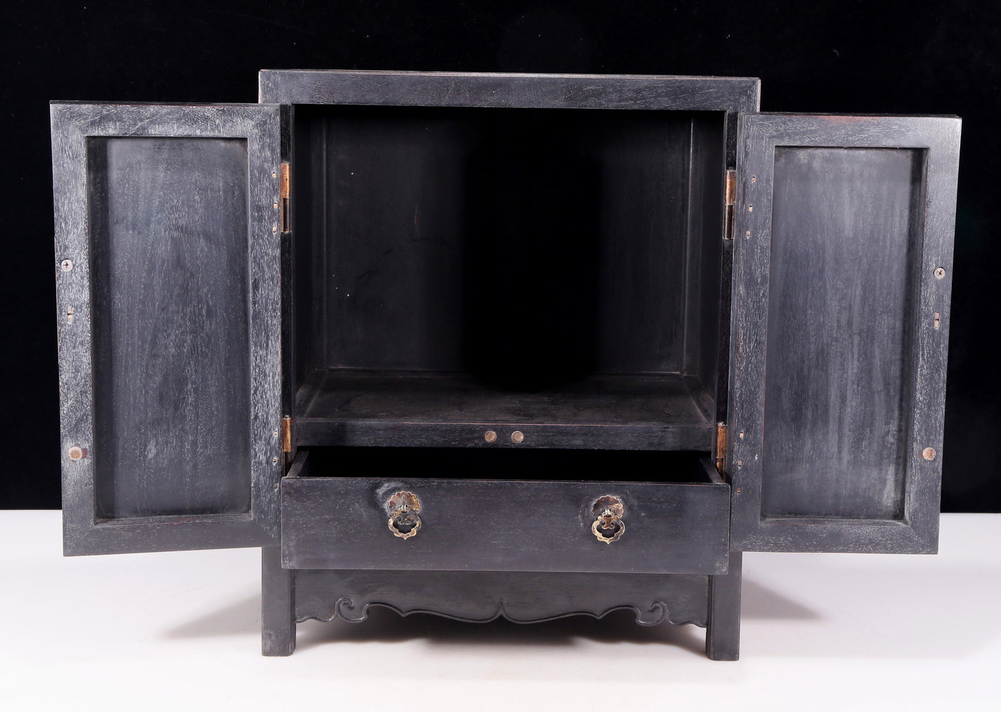 An exquisite zitanwood cabinet with inlaid gemstones and flower and bird patterns