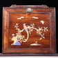 An exquisite huanghuali wood suitcase inlaid with gemstones and flower and bird patterns