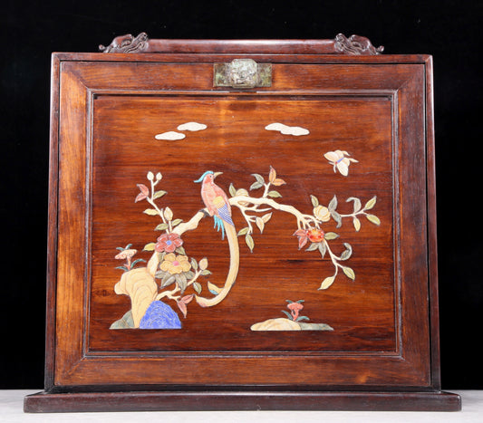 An exquisite huanghuali wood suitcase inlaid with gemstones and flower and bird patterns