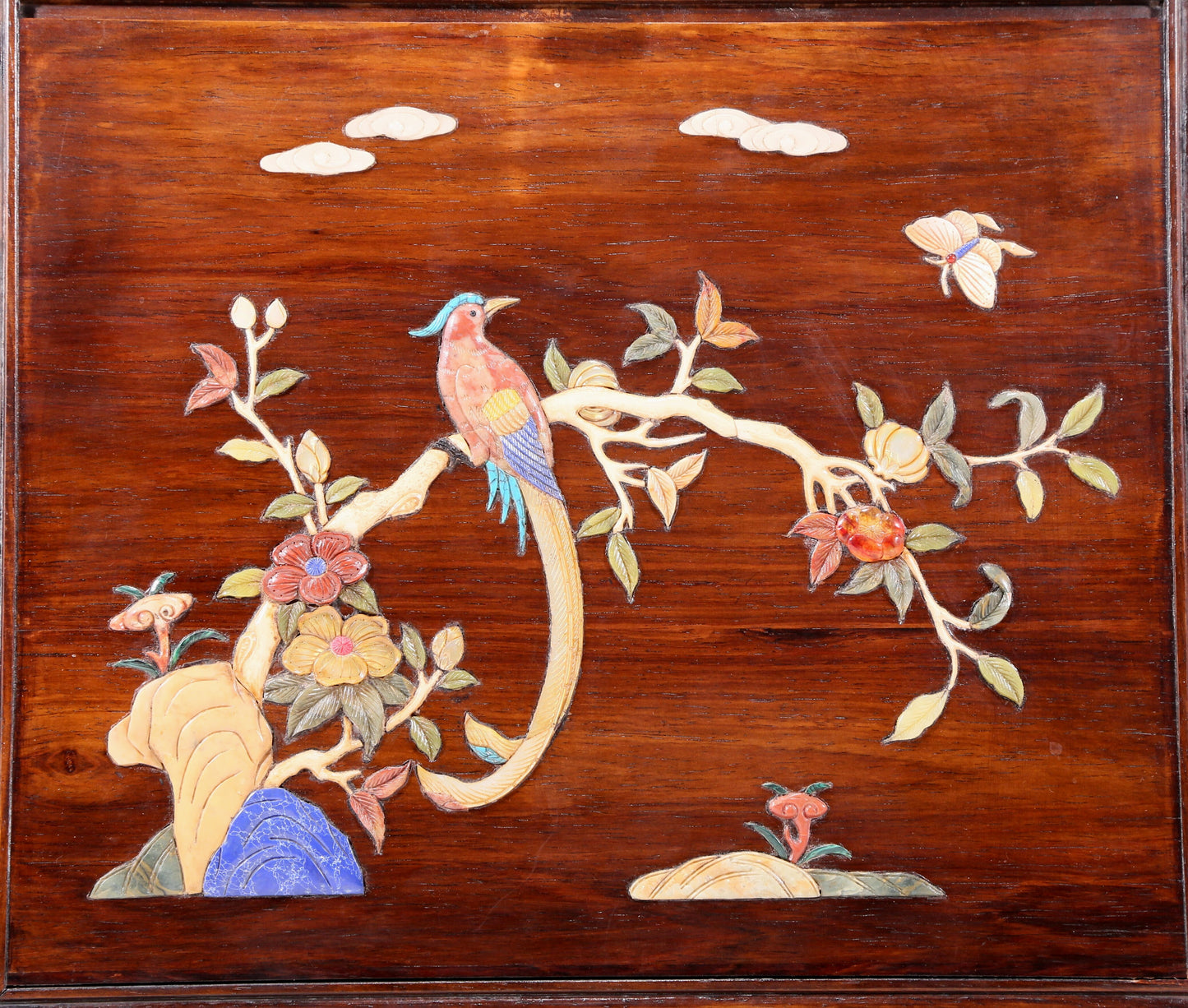 An exquisite huanghuali wood suitcase inlaid with gemstones and flower and bird patterns