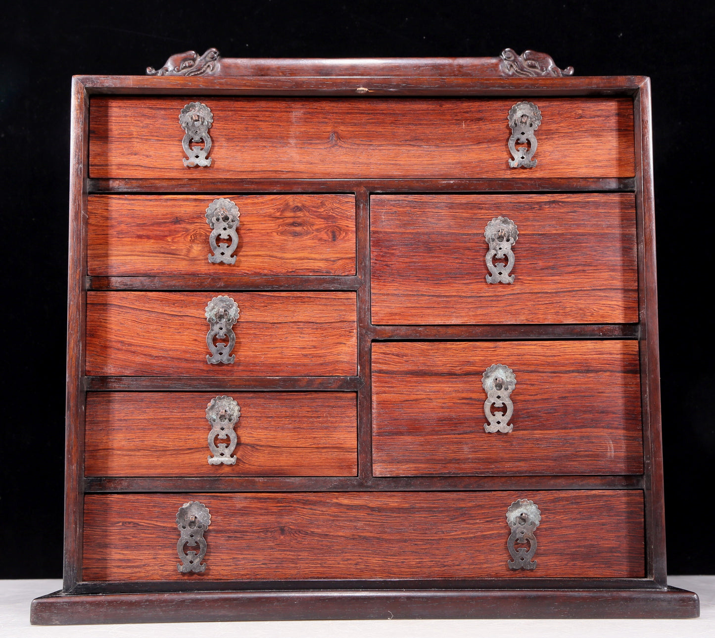 An exquisite huanghuali wood suitcase inlaid with gemstones and flower and bird patterns