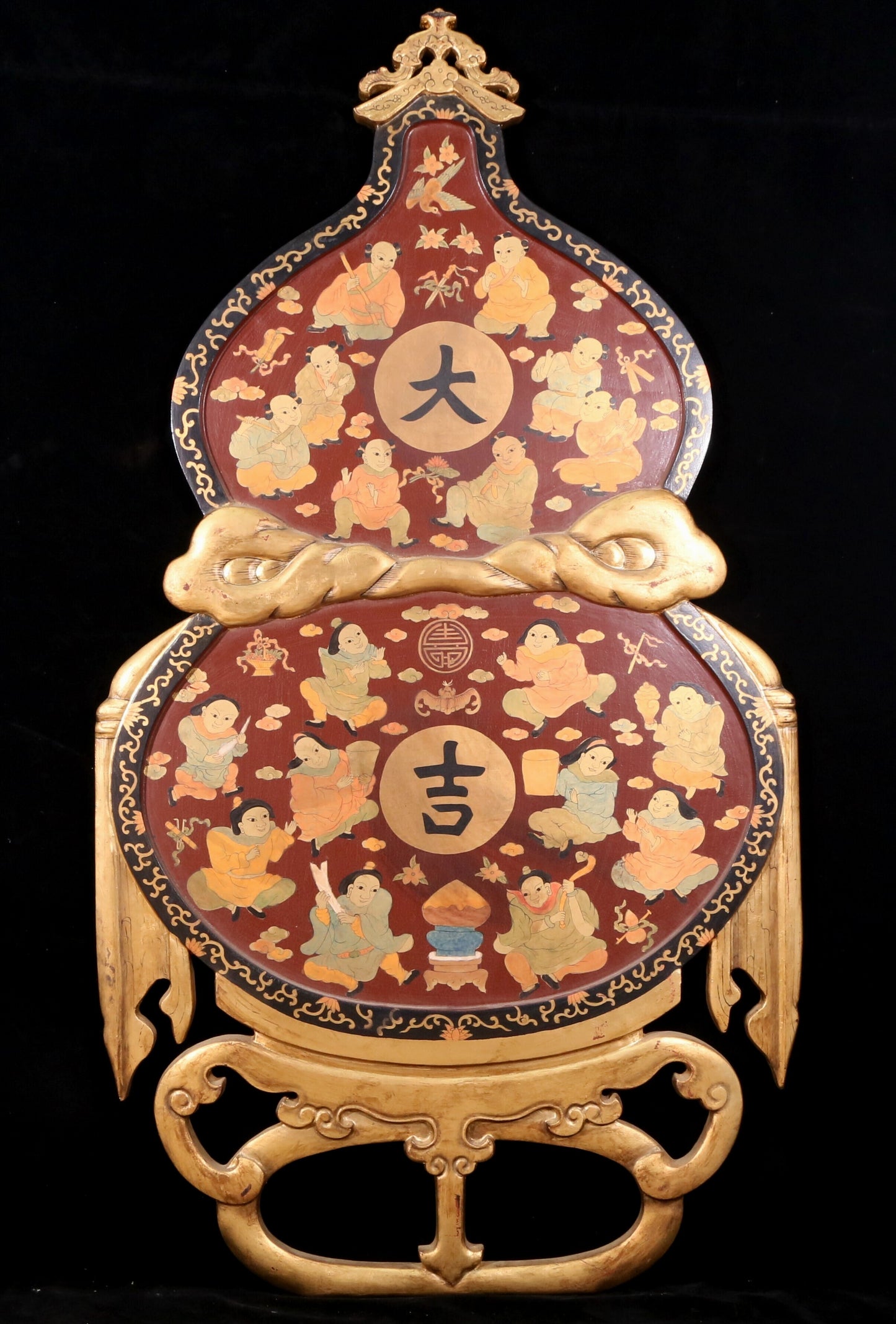 A pair of exquisite zitanwood painted figures with festive patterns and gourd hanging screens