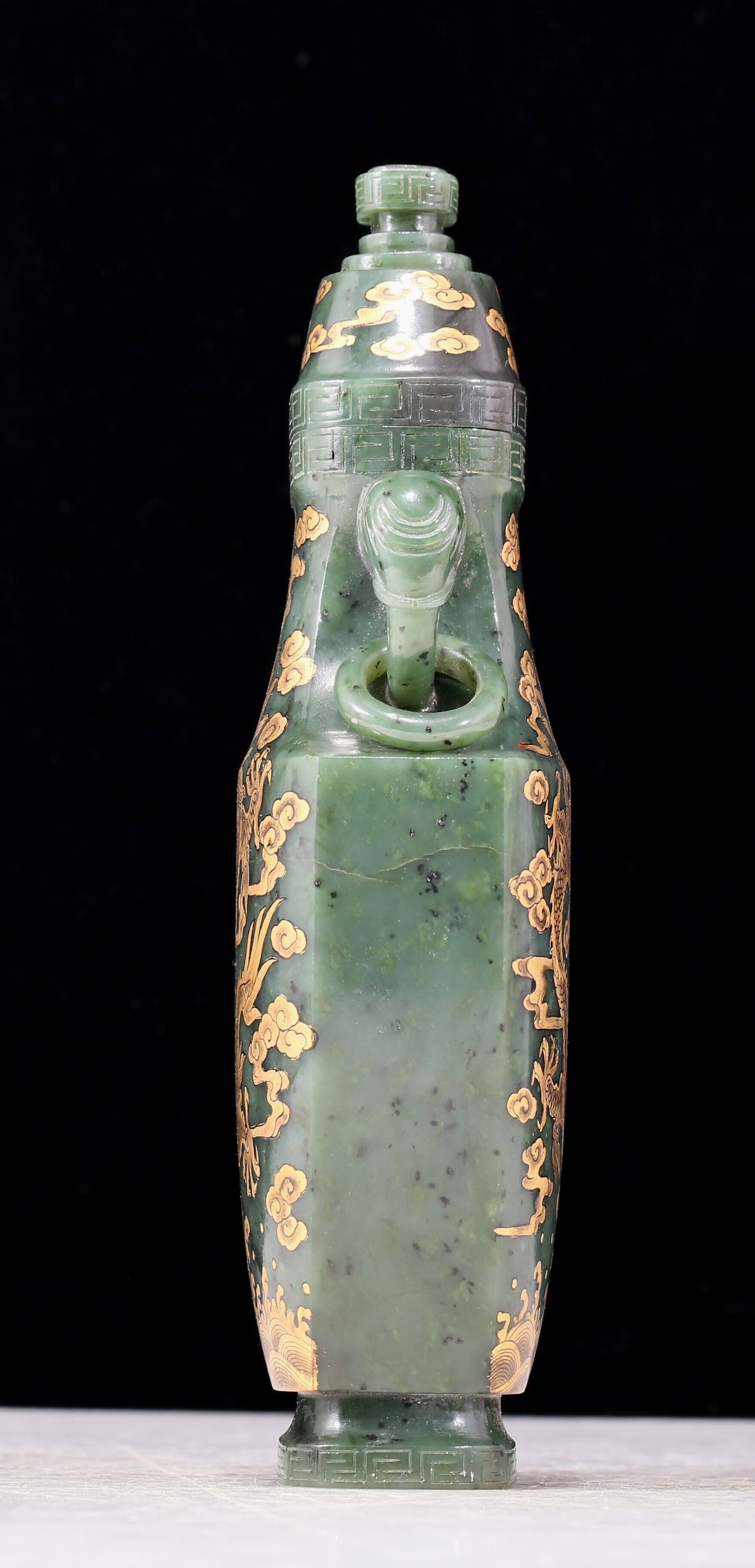 A perfect jasper bottle with golden dragon pattern and elephant ear cap