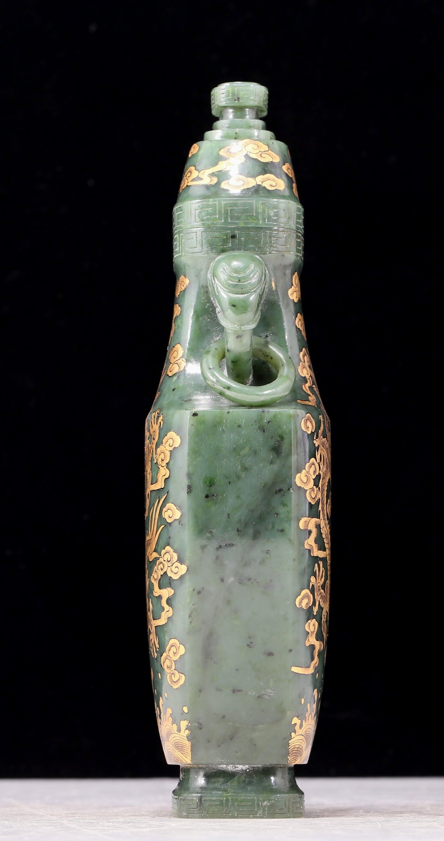 A perfect jasper bottle with golden dragon pattern and elephant ear cap