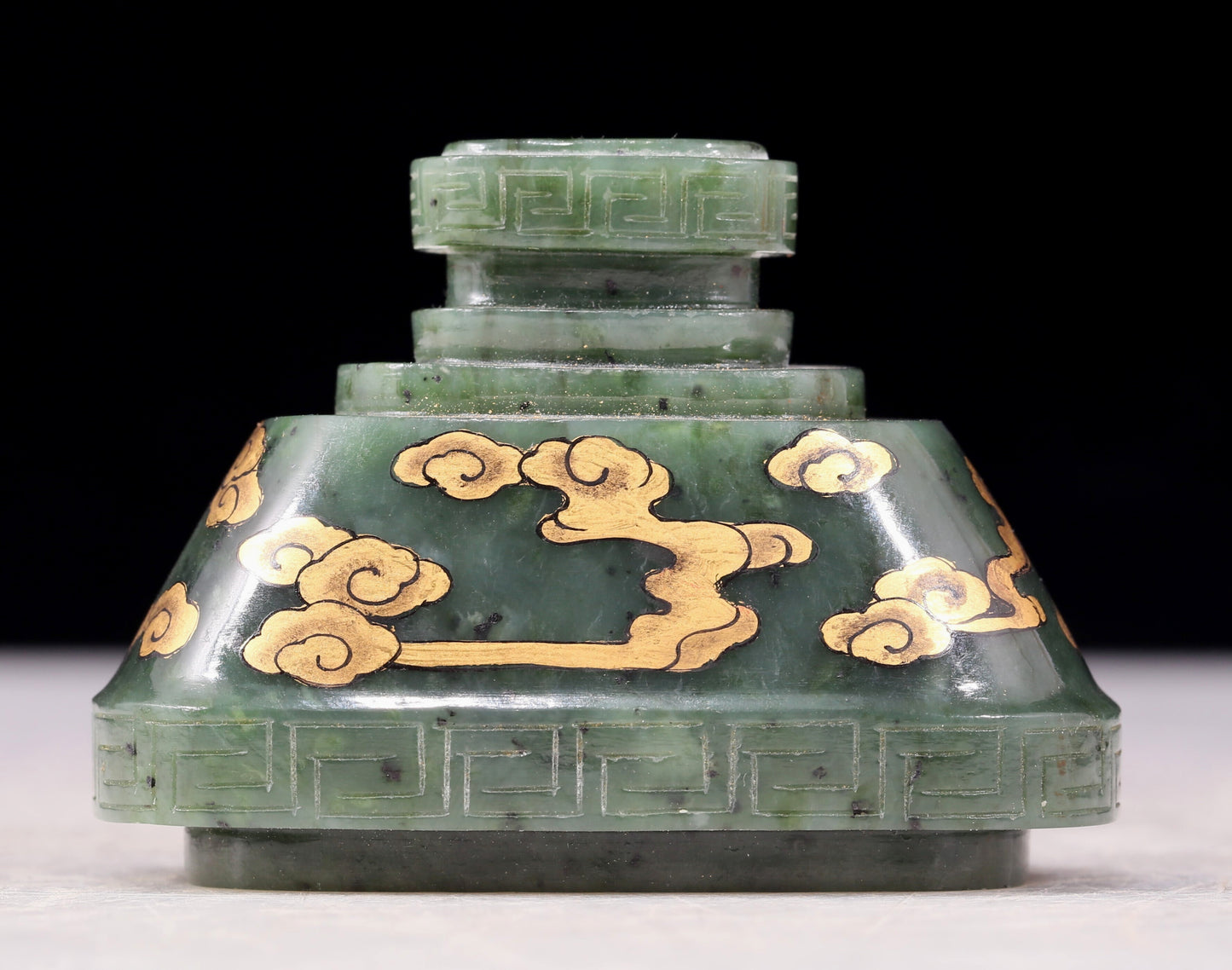 A perfect jasper bottle with golden dragon pattern and elephant ear cap