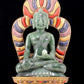 A solemn gilt bronze and gem-set jasper statue of Gautama Buddha