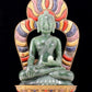 A solemn gilt bronze and gem-set jasper statue of Gautama Buddha