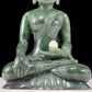 A solemn gilt bronze and gem-set jasper statue of Gautama Buddha