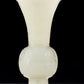 An exquisite white jade bottle with animal mask pattern