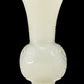 An exquisite white jade bottle with animal mask pattern