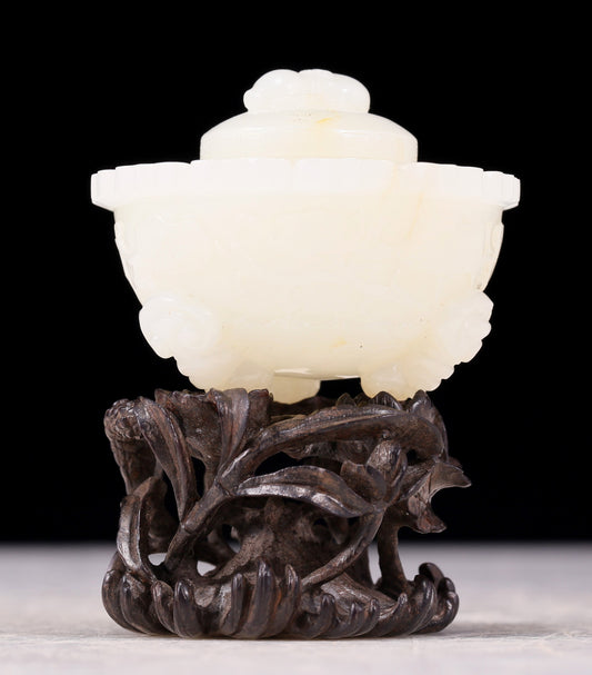 An exquisite white jade tripod censer with flower and bird patterns and lid