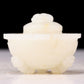 An exquisite white jade tripod censer with flower and bird patterns and lid