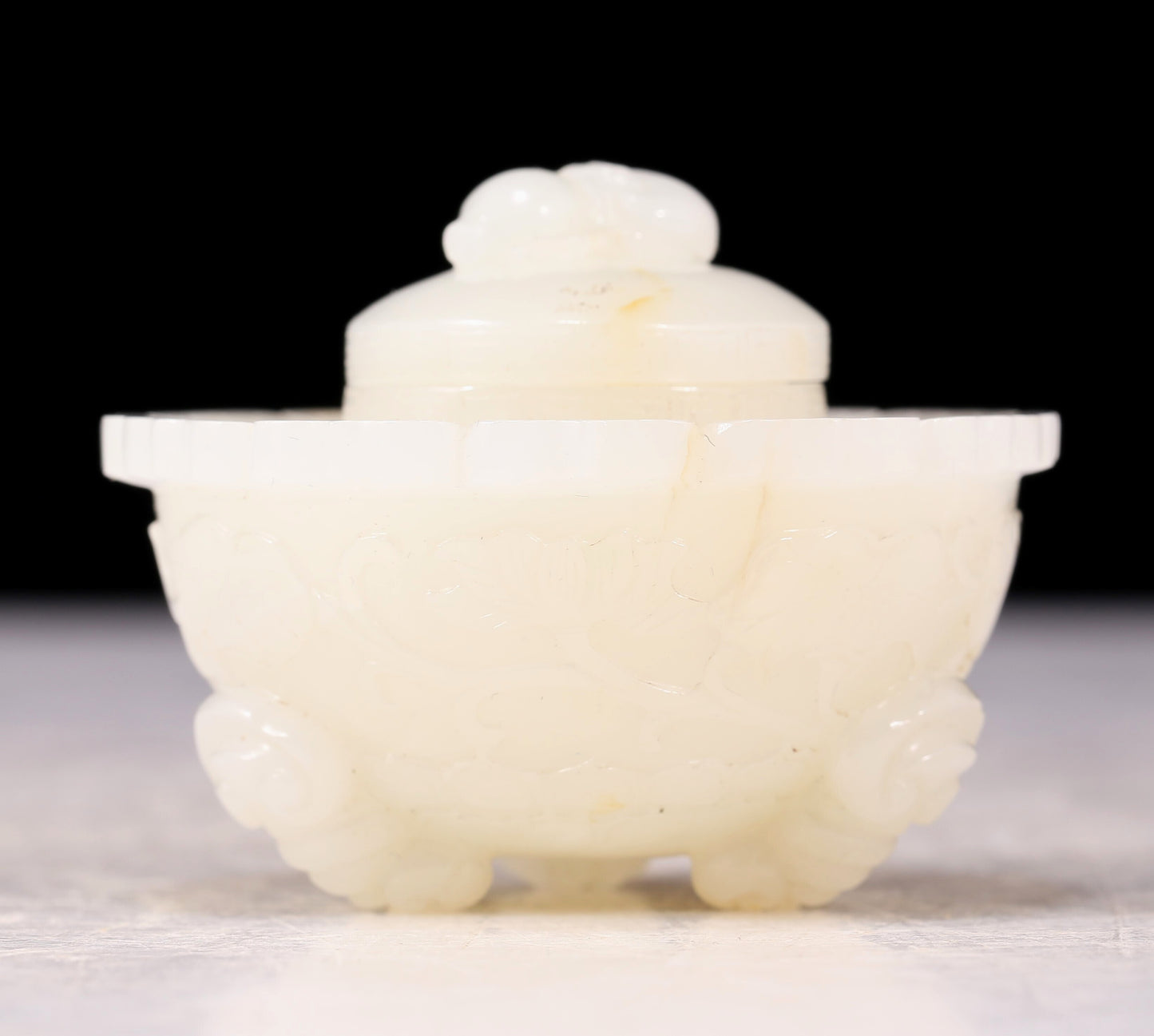 An exquisite white jade tripod censer with flower and bird patterns and lid